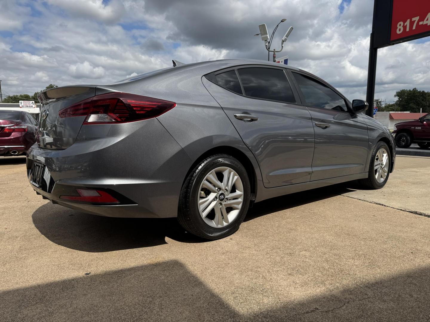 2019 GRAY /BLACK HYUNDAI ELANTRA LIMITED; SEL LIMITED (5NPD84LF8KH) with an 1.5L engine, 6-Speed Automatic transmission, located at 5900 E. Lancaster Ave., Fort Worth, TX, 76112, (817) 457-5456, 0.000000, 0.000000 - The 2019 Hyundai Elantra Limited is a fuel-efficient FWD sedan with a 1.8L engine and 6-speed automatic transmission. Enjoy backup camera, lane assist, phone connectivity, cloth seats, and alloy wheels for a reliable, tech-ready ride. - Photo#3