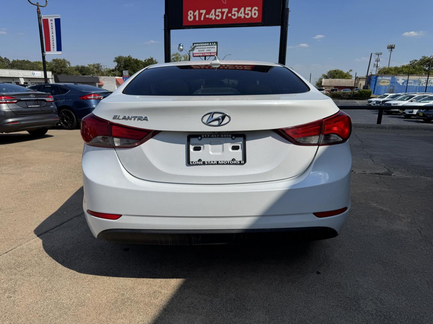 2016 WHITE /TAN HYUNDAI ELANTRA LIMITED; SE; LIMITIED (5NPDH4AEXGH) with an 1.8L engine, 6-Speed Automatic transmission, located at 5900 E. Lancaster Ave., Fort Worth, TX, 76112, (817) 457-5456, 0.000000, 0.000000 - Check out this 2016 Hyundai Elantra Limited, a reliable sedan with seating for five. It features front heated seats, push-to-start, a backup camera, and comfortable cloth interior. With a fuel-efficient 1.8L engine and smooth 6-speed automatic transmission, it’s ready for your daily drives around - Photo#4