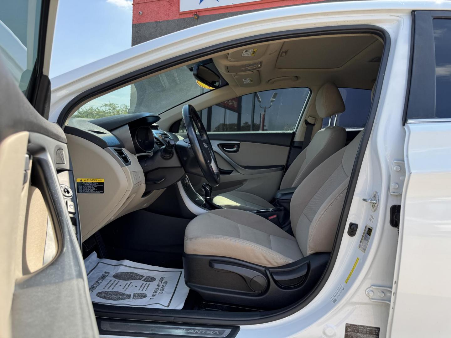 2016 WHITE /TAN HYUNDAI ELANTRA LIMITED; SE; LIMITIED (5NPDH4AEXGH) with an 1.8L engine, 6-Speed Automatic transmission, located at 5900 E. Lancaster Ave., Fort Worth, TX, 76112, (817) 457-5456, 0.000000, 0.000000 - Check out this 2016 Hyundai Elantra Limited, a reliable sedan with seating for five. It features front heated seats, push-to-start, a backup camera, and comfortable cloth interior. With a fuel-efficient 1.8L engine and smooth 6-speed automatic transmission, it’s ready for your daily drives around - Photo#8
