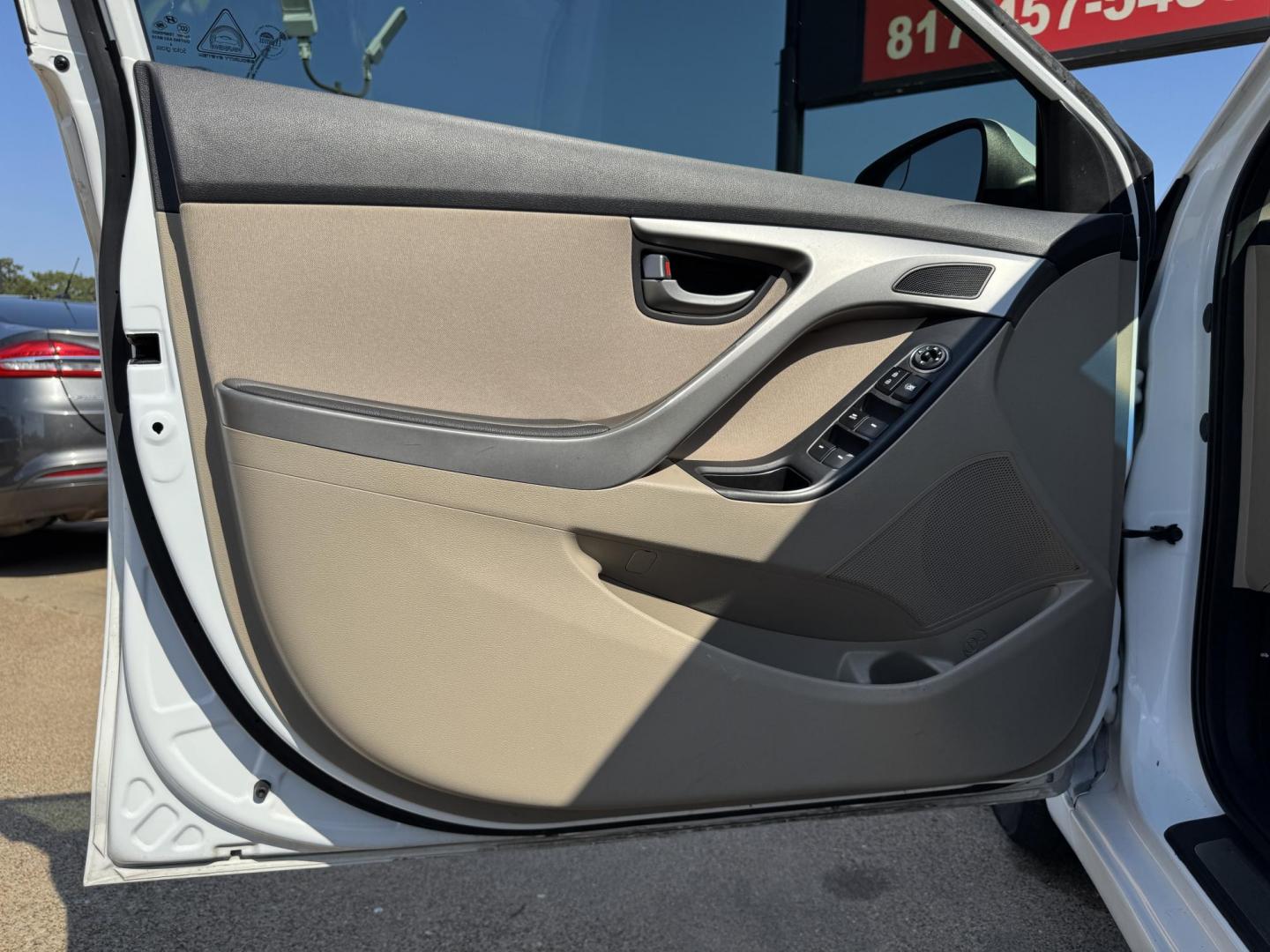 2016 WHITE /TAN HYUNDAI ELANTRA LIMITED; SE; LIMITIED (5NPDH4AEXGH) with an 1.8L engine, 6-Speed Automatic transmission, located at 5900 E. Lancaster Ave., Fort Worth, TX, 76112, (817) 457-5456, 0.000000, 0.000000 - Check out this 2016 Hyundai Elantra Limited, a reliable sedan with seating for five. It features front heated seats, push-to-start, a backup camera, and comfortable cloth interior. With a fuel-efficient 1.8L engine and smooth 6-speed automatic transmission, it’s ready for your daily drives around - Photo#7