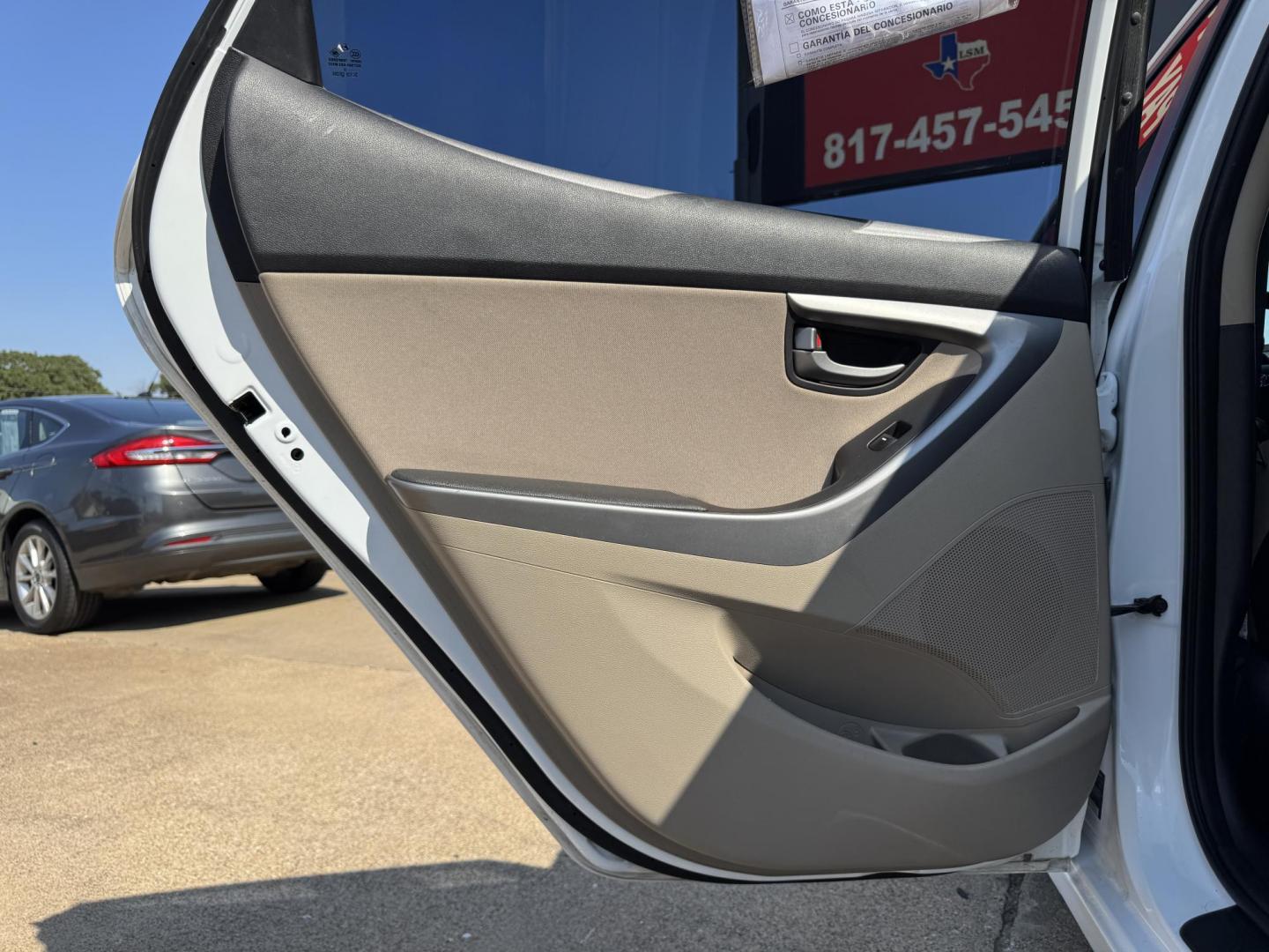 2016 WHITE /TAN HYUNDAI ELANTRA LIMITED; SE; LIMITIED (5NPDH4AEXGH) with an 1.8L engine, 6-Speed Automatic transmission, located at 5900 E. Lancaster Ave., Fort Worth, TX, 76112, (817) 457-5456, 0.000000, 0.000000 - Check out this 2016 Hyundai Elantra Limited, a reliable sedan with seating for five. It features front heated seats, push-to-start, a backup camera, and comfortable cloth interior. With a fuel-efficient 1.8L engine and smooth 6-speed automatic transmission, it’s ready for your daily drives around - Photo#10