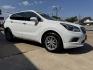 2017 WHITE /TAN BUICK ENVISION ESSENCE ESSENSE (LRBFXBSA8HD) with an 2.5L engine, 6-Speed Automatic transmission, located at 5900 E. Lancaster Ave., Fort Worth, TX, 76112, (817) 457-5456, 0.000000, 0.000000 - The 2017 Buick Envision Essence is a 5-passenger SUV with a 2.5L 4-cylinder engine and 6-speed automatic transmission. It features an electronic rear hatch, heated front and rear leather seats, dual climate control for both front and rear passengers, push-to-start, park assist, and a backup camera.- Photo#2