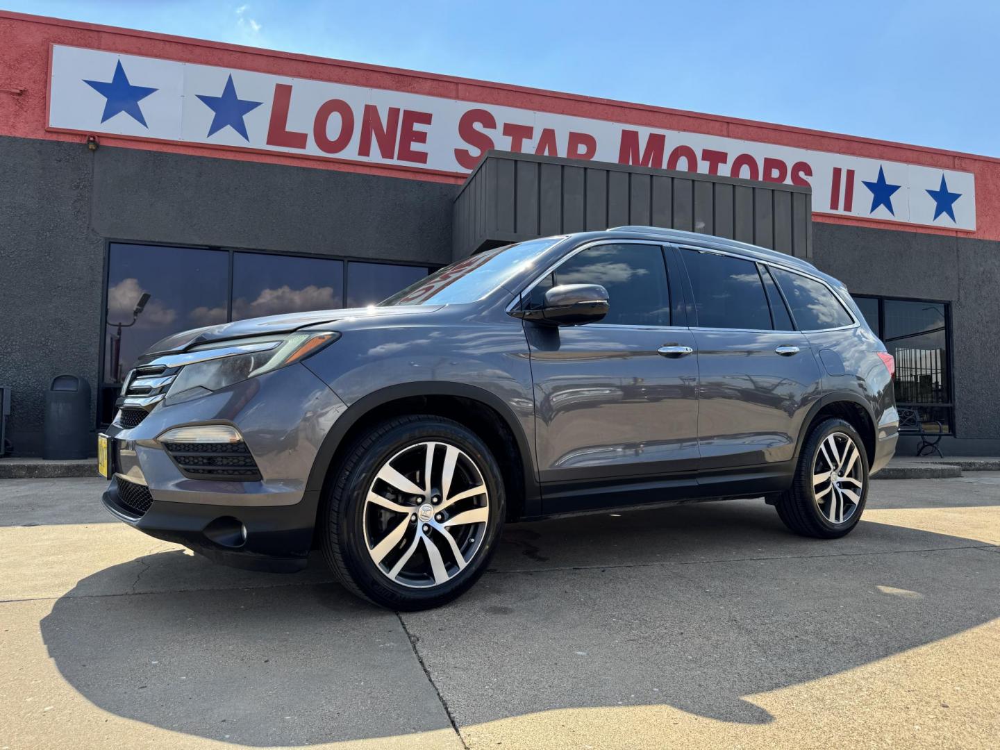 2016 GRAY HONDA PILOT TOURING-RES (5FNYF5H96GB) , located at 5900 E. Lancaster Ave., Fort Worth, TX, 76112, (817) 457-5456, 0.000000, 0.000000 - Photo#0