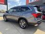 2016 GRAY HONDA PILOT TOURING-RES (5FNYF5H96GB) , located at 5900 E. Lancaster Ave., Fort Worth, TX, 76112, (817) 457-5456, 0.000000, 0.000000 - Photo#7