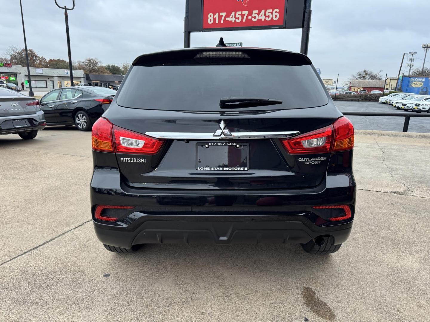 2018 BLACK MITSUBISHI OUTLANDER SPORT LE; (JA4AP3AU5JZ) , located at 5900 E. Lancaster Ave., Fort Worth, TX, 76112, (817) 457-5456, 0.000000, 0.000000 - Photo#4