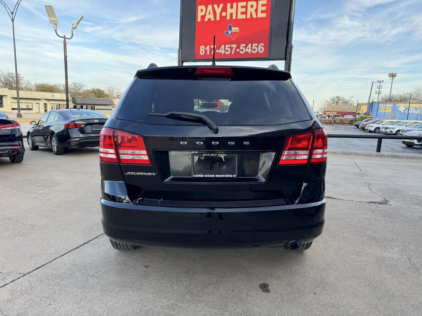2016 BLACK DODGE JOURNEY SE (3C4PDCAB8GT) , located at 5900 E. Lancaster Ave., Fort Worth, TX, 76112, (817) 457-5456, 0.000000, 0.000000 - Photo#4