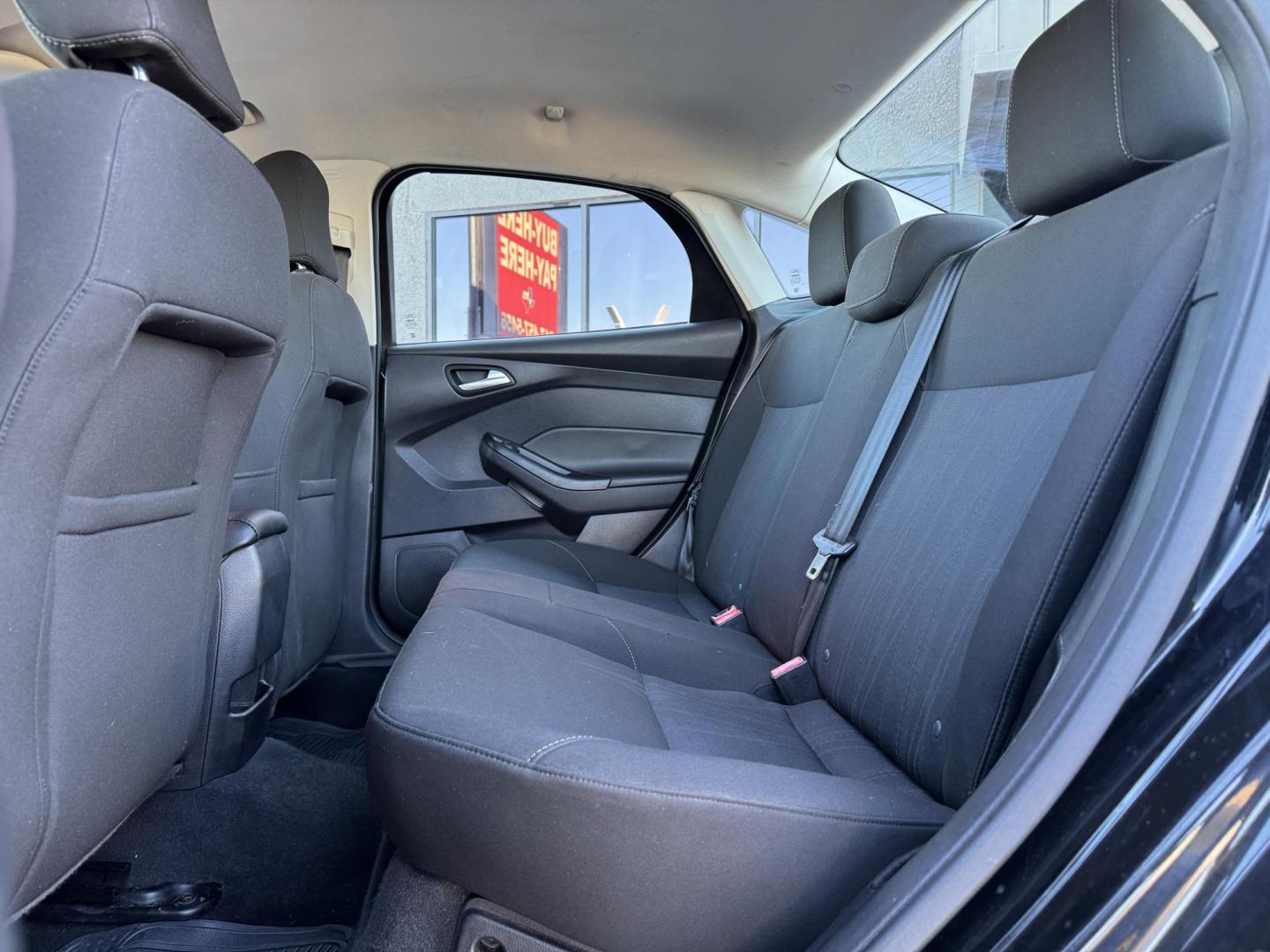 2015 BLACK FORD FOCUS SE (1FADP3F24FL) , located at 5900 E. Lancaster Ave., Fort Worth, TX, 76112, (817) 457-5456, 0.000000, 0.000000 - Photo#11