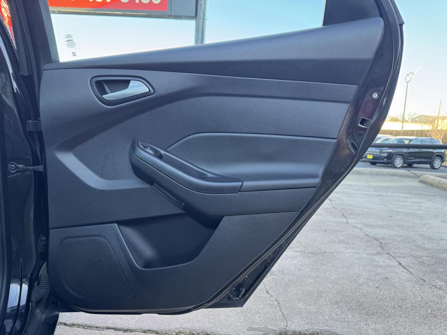 2015 BLACK FORD FOCUS SE (1FADP3F24FL) , located at 5900 E. Lancaster Ave., Fort Worth, TX, 76112, (817) 457-5456, 0.000000, 0.000000 - Photo#12