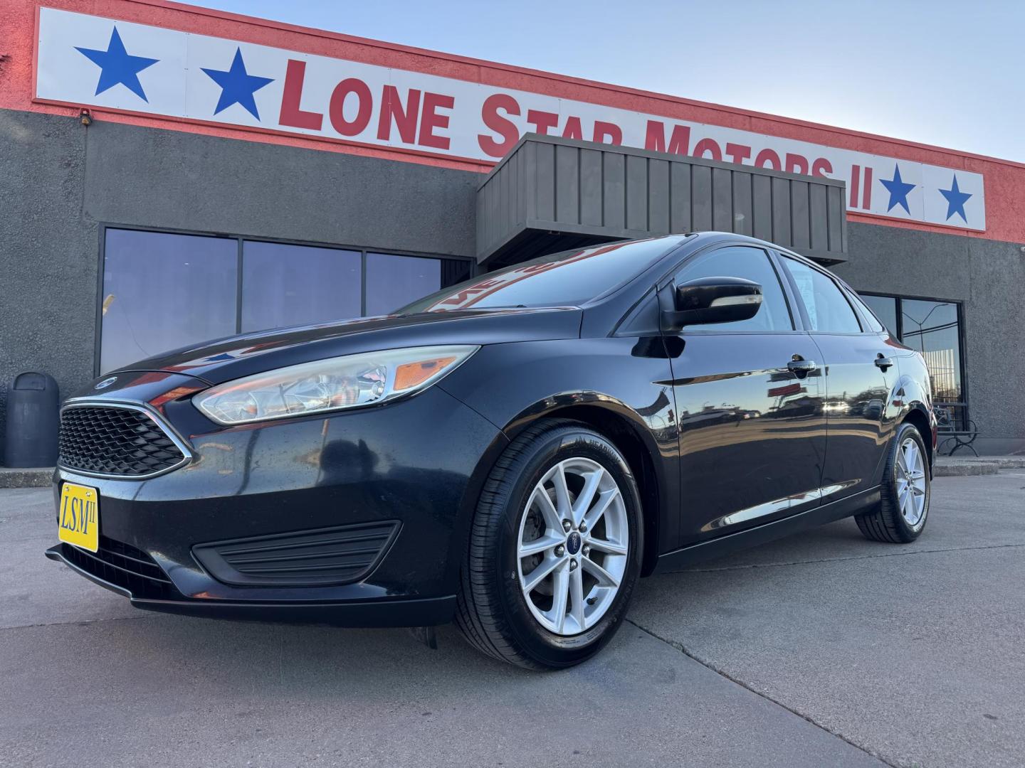 2015 BLACK FORD FOCUS SE (1FADP3F24FL) , located at 5900 E. Lancaster Ave., Fort Worth, TX, 76112, (817) 457-5456, 0.000000, 0.000000 - Photo#0
