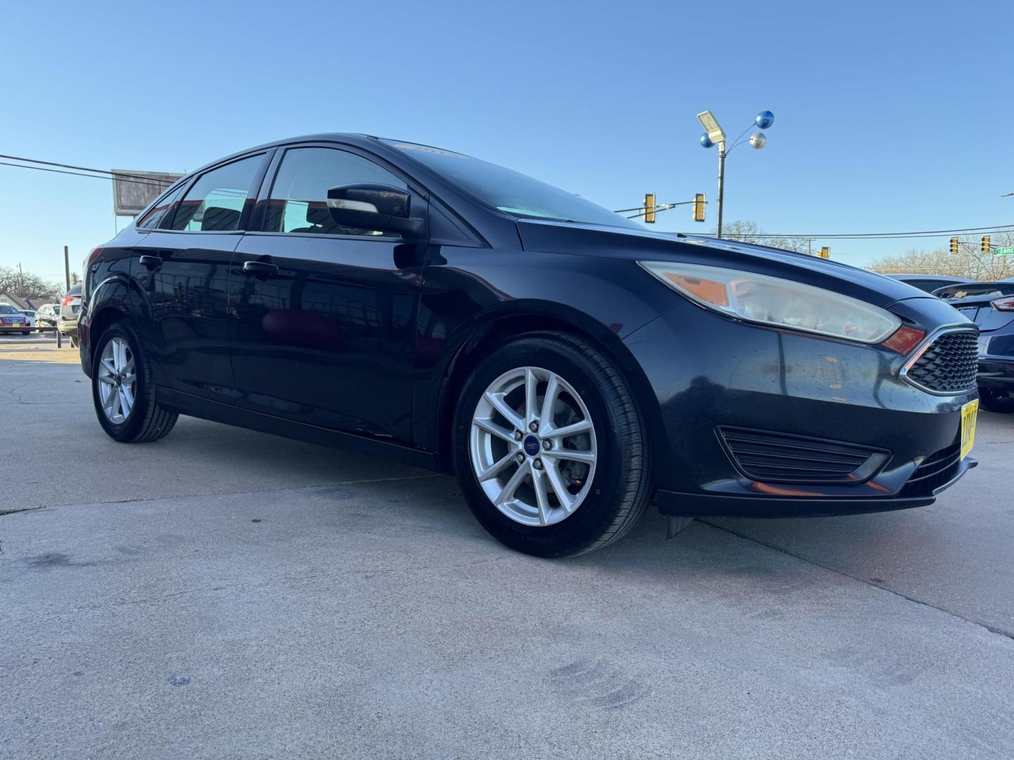 2015 BLACK FORD FOCUS SE (1FADP3F24FL) , located at 5900 E. Lancaster Ave., Fort Worth, TX, 76112, (817) 457-5456, 0.000000, 0.000000 - Photo#2
