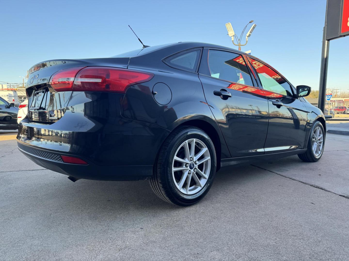 2015 BLACK FORD FOCUS SE (1FADP3F24FL) , located at 5900 E. Lancaster Ave., Fort Worth, TX, 76112, (817) 457-5456, 0.000000, 0.000000 - Photo#3