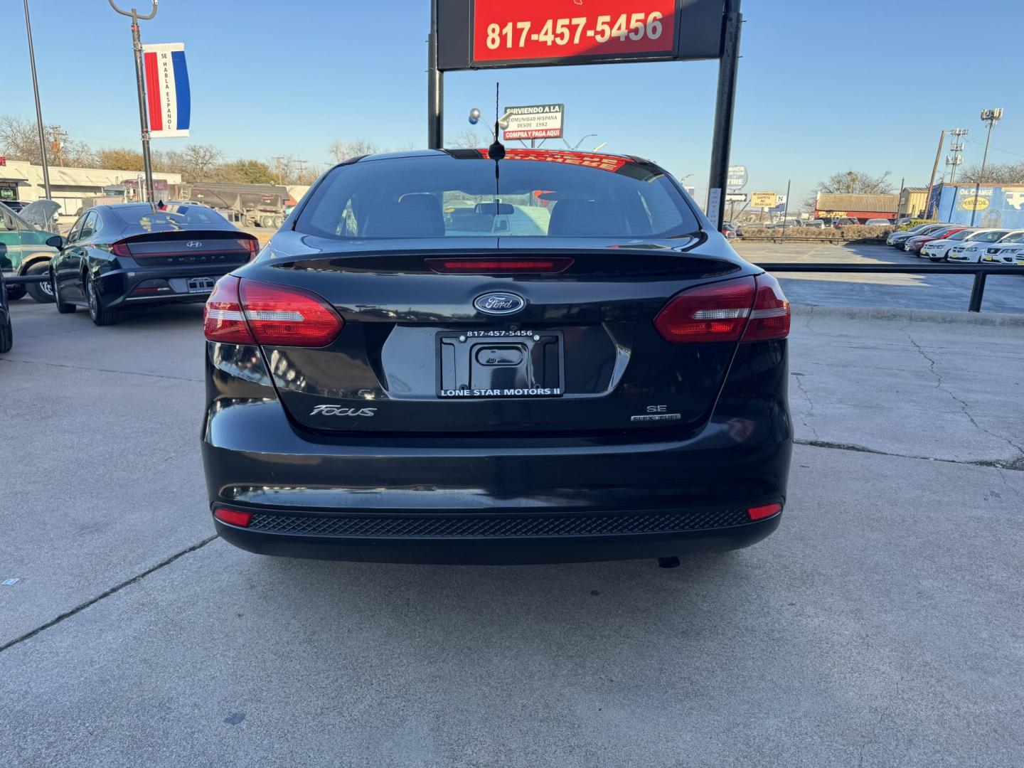 2015 BLACK FORD FOCUS SE (1FADP3F24FL) , located at 5900 E. Lancaster Ave., Fort Worth, TX, 76112, (817) 457-5456, 0.000000, 0.000000 - Photo#4