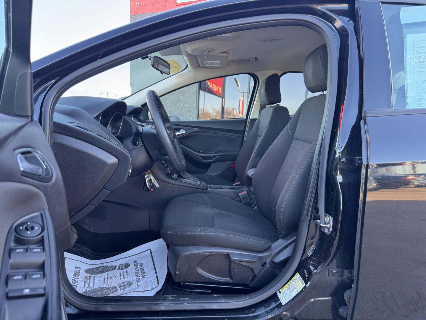 2015 BLACK FORD FOCUS SE (1FADP3F24FL) , located at 5900 E. Lancaster Ave., Fort Worth, TX, 76112, (817) 457-5456, 0.000000, 0.000000 - Photo#8