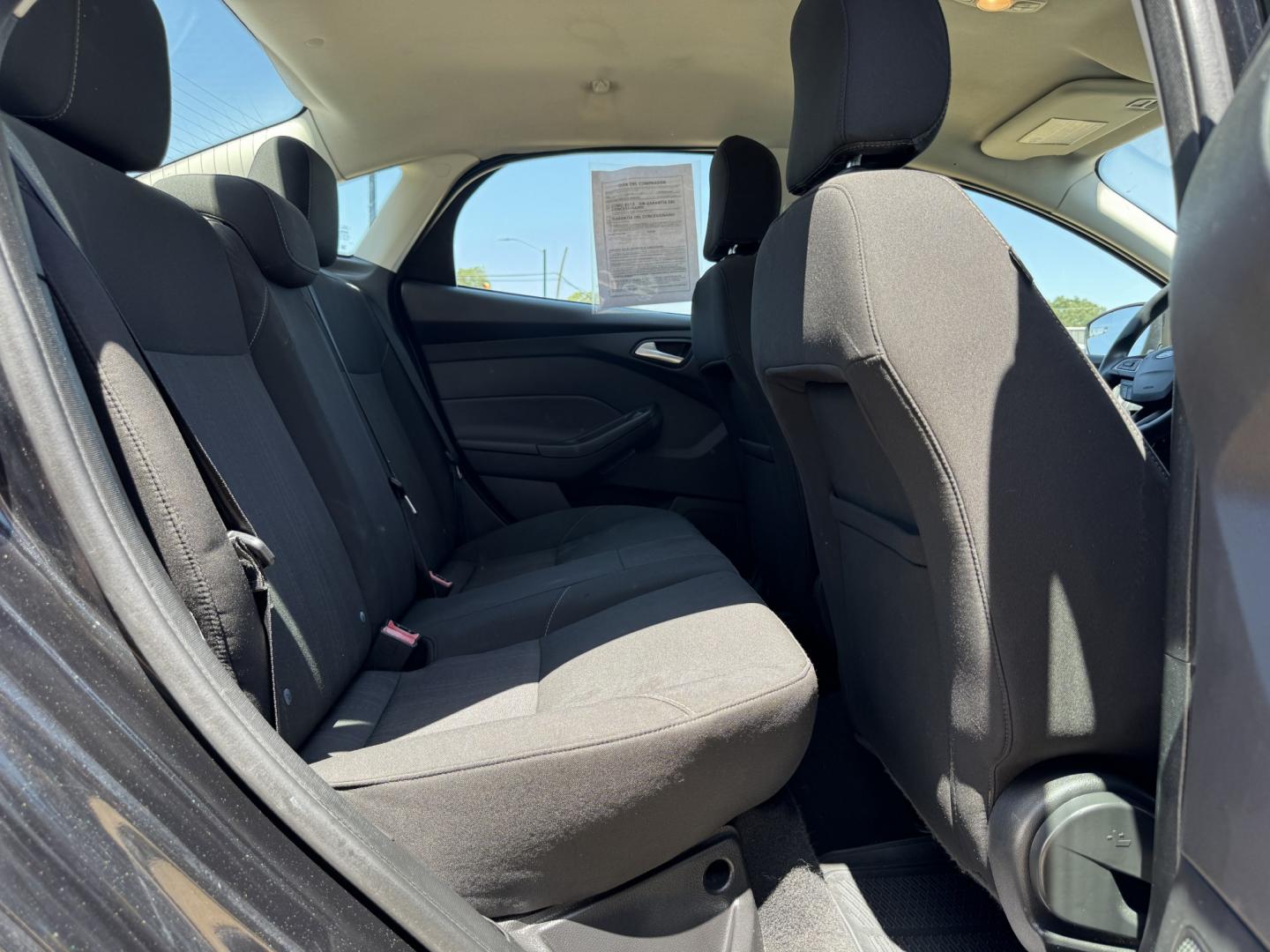 2015 BLACK FORD FOCUS SE (1FADP3F24FL) , located at 5900 E. Lancaster Ave., Fort Worth, TX, 76112, (817) 457-5456, 0.000000, 0.000000- Photo#14