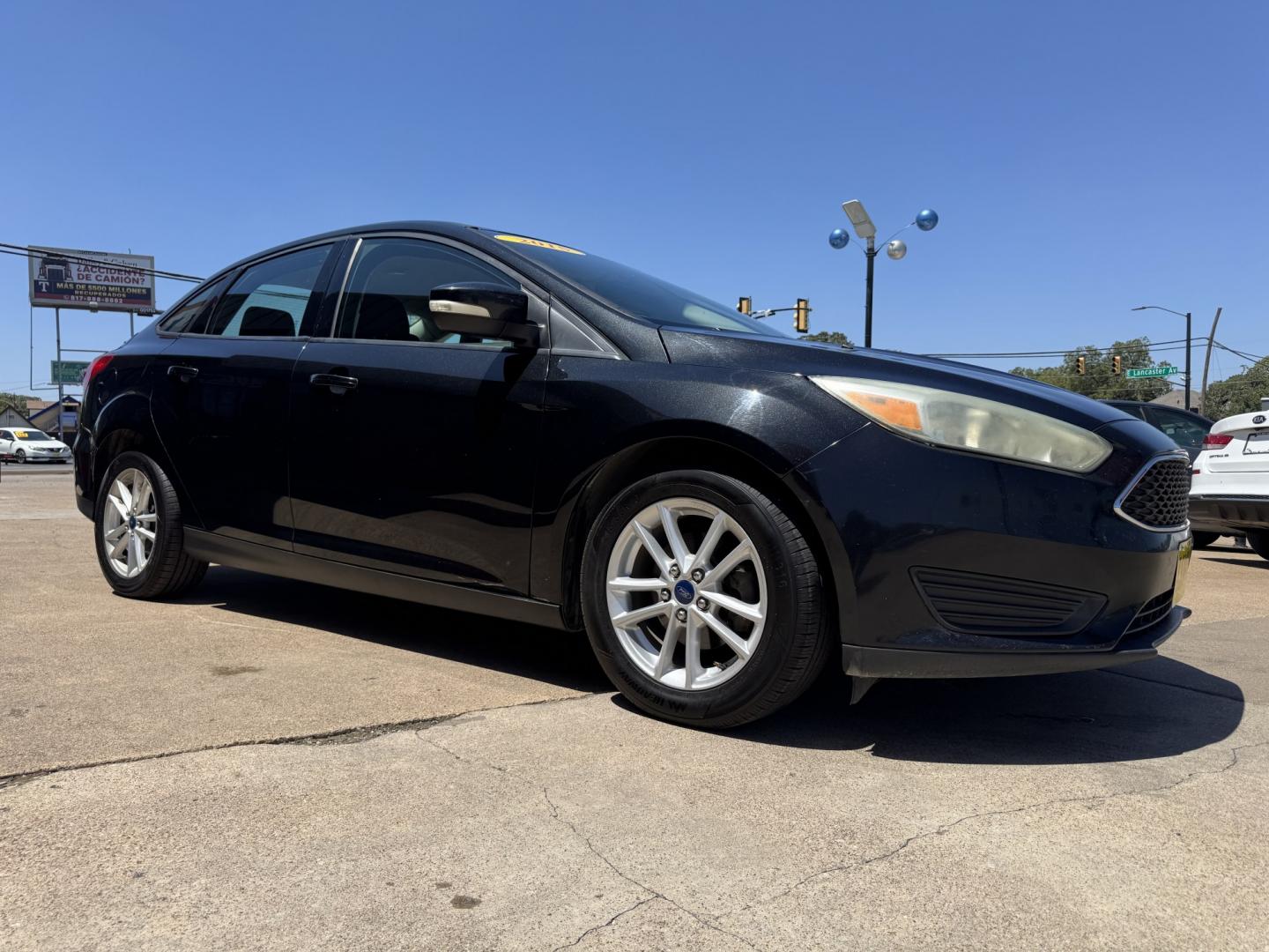 2015 BLACK FORD FOCUS SE (1FADP3F24FL) , located at 5900 E. Lancaster Ave., Fort Worth, TX, 76112, (817) 457-5456, 0.000000, 0.000000- Photo#2