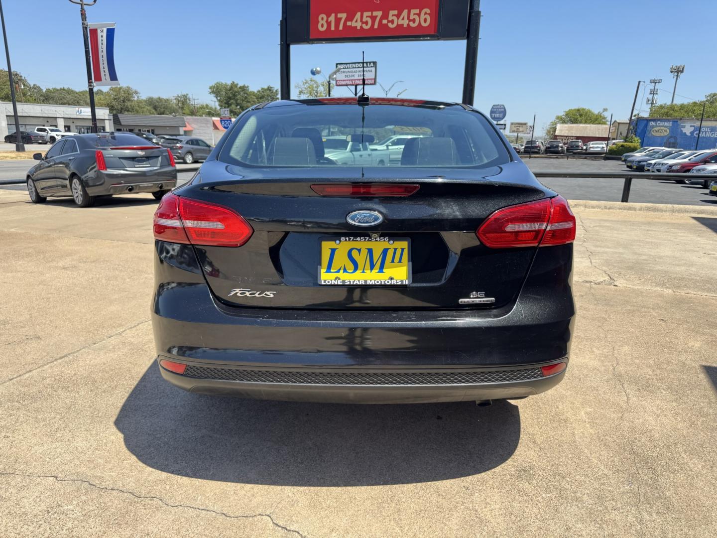2015 BLACK FORD FOCUS SE (1FADP3F24FL) , located at 5900 E. Lancaster Ave., Fort Worth, TX, 76112, (817) 457-5456, 0.000000, 0.000000- Photo#4
