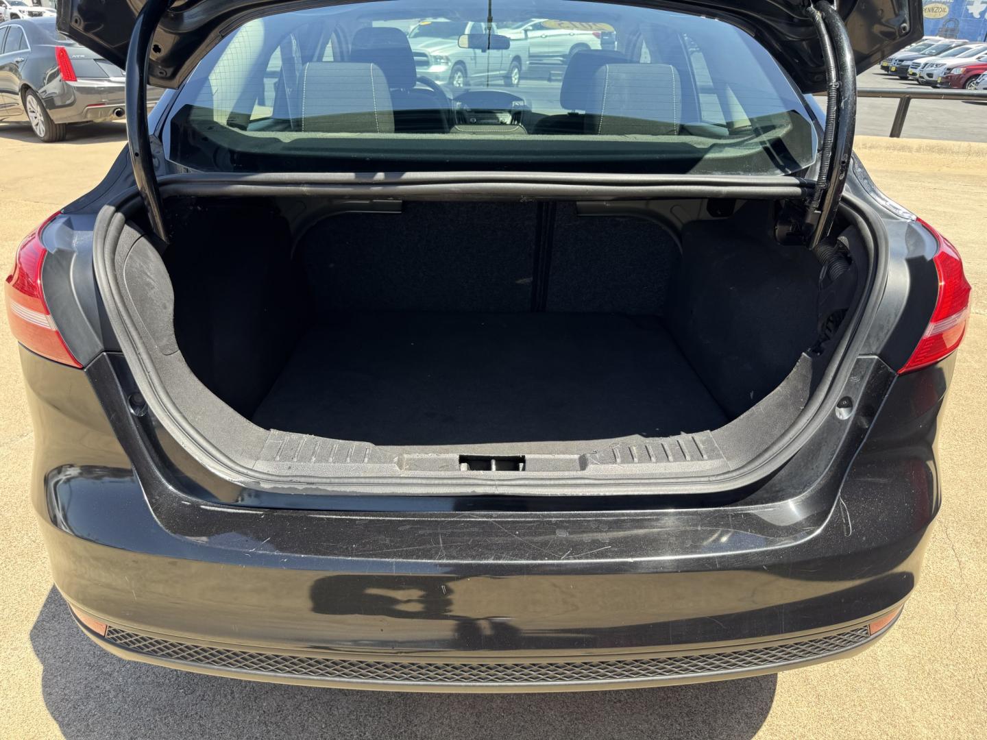 2015 BLACK FORD FOCUS SE (1FADP3F24FL) , located at 5900 E. Lancaster Ave., Fort Worth, TX, 76112, (817) 457-5456, 0.000000, 0.000000- Photo#5
