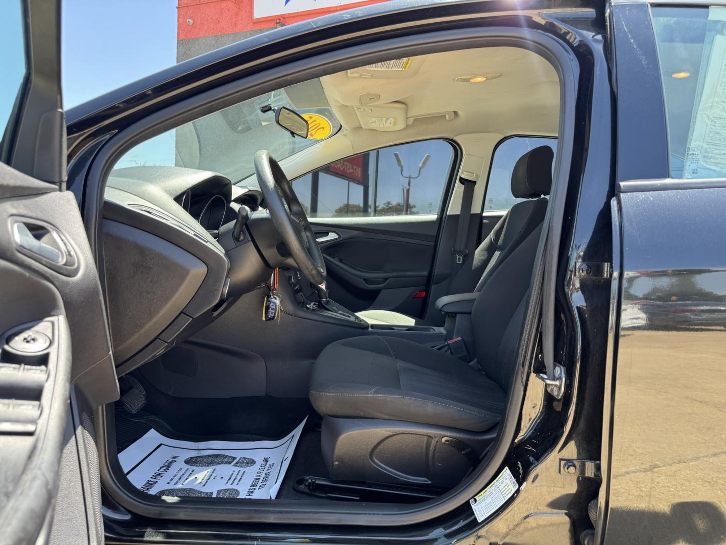 2015 BLACK FORD FOCUS SE (1FADP3F24FL) , located at 5900 E. Lancaster Ave., Fort Worth, TX, 76112, (817) 457-5456, 0.000000, 0.000000- Photo#8