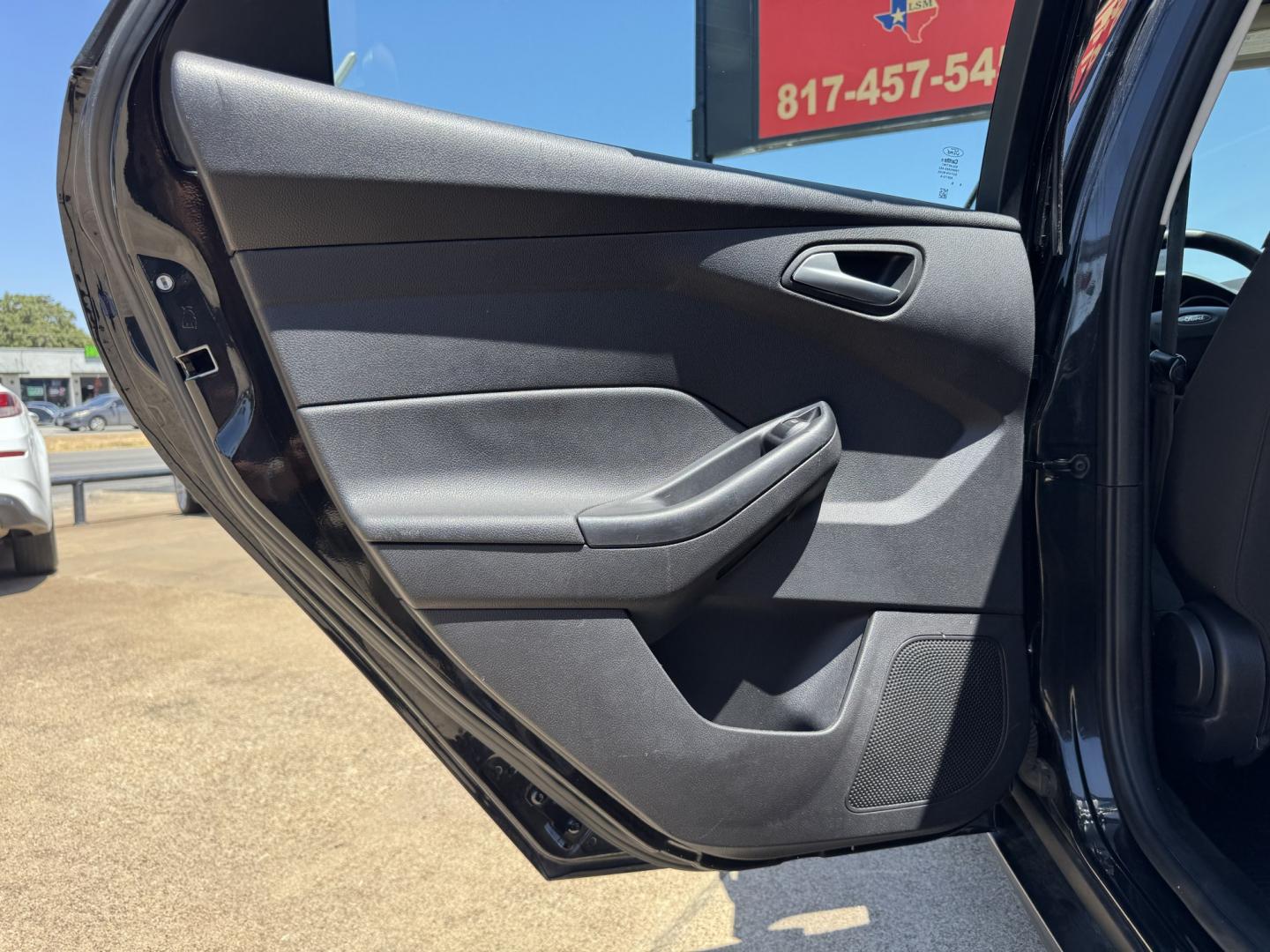 2015 BLACK FORD FOCUS SE (1FADP3F24FL) , located at 5900 E. Lancaster Ave., Fort Worth, TX, 76112, (817) 457-5456, 0.000000, 0.000000- Photo#11