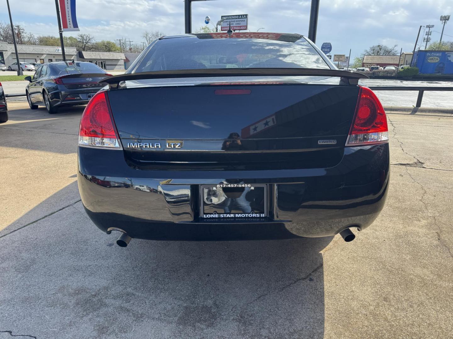 2014 BLACK CHEVROLET IMPALA LIMITED LTZ (2G1WC5E32E1) , located at 5900 E. Lancaster Ave., Fort Worth, TX, 76112, (817) 457-5456, 0.000000, 0.000000 - Photo#4