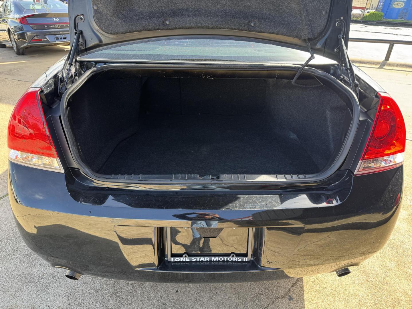 2014 BLACK CHEVROLET IMPALA LIMITED LTZ (2G1WC5E32E1) , located at 5900 E. Lancaster Ave., Fort Worth, TX, 76112, (817) 457-5456, 0.000000, 0.000000 - Photo#5