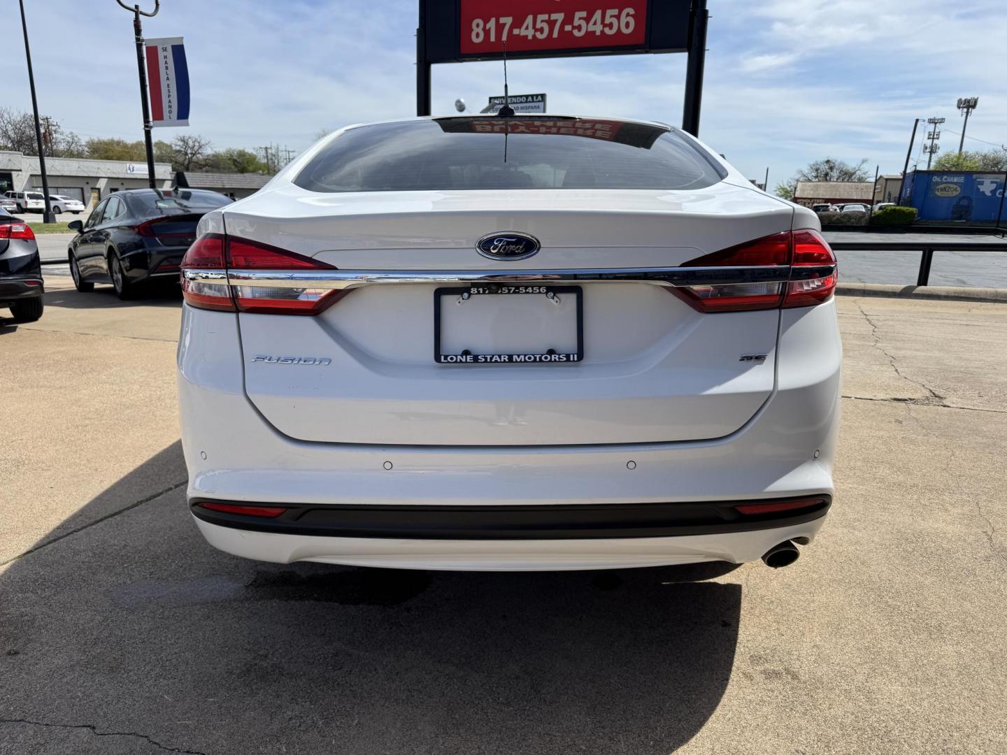 2018 WHITE FORD FUSION SE (3FA6P0H70JR) , located at 5900 E. Lancaster Ave., Fort Worth, TX, 76112, (817) 457-5456, 0.000000, 0.000000 - Photo#4