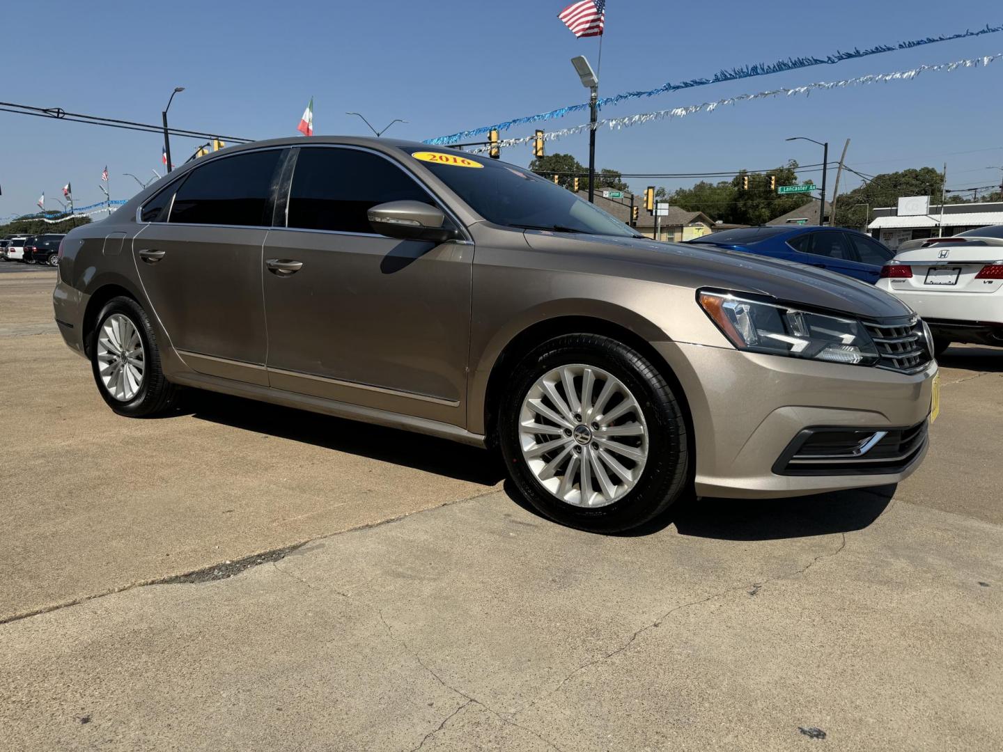 2016 GOLD VOLKSWAGEN PASSAT (1VWBS7A37GC) , located at 5900 E. Lancaster Ave., Fort Worth, TX, 76112, (817) 457-5456, 0.000000, 0.000000 - This is a 2016 VOLKSWAGEN PASSAT 4 DR SEDAN that is in excellent condition. The interior is clean with no rips or tears or stains. All power windows, door locks and seats. Ice cold AC for those hot Texas summer days. It is equipped with a CD player, AM/FM radio, AUX port, Bluetooth connectivity and - Photo#3