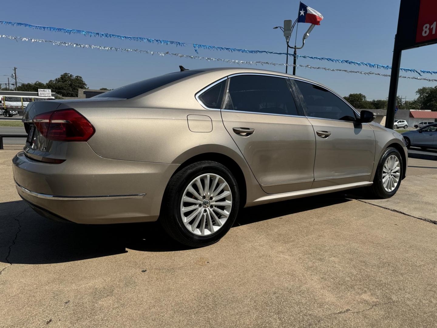 2016 GOLD VOLKSWAGEN PASSAT (1VWBS7A37GC) , located at 5900 E. Lancaster Ave., Fort Worth, TX, 76112, (817) 457-5456, 0.000000, 0.000000 - This is a 2016 VOLKSWAGEN PASSAT 4 DR SEDAN that is in excellent condition. The interior is clean with no rips or tears or stains. All power windows, door locks and seats. Ice cold AC for those hot Texas summer days. It is equipped with a CD player, AM/FM radio, AUX port, Bluetooth connectivity and - Photo#4