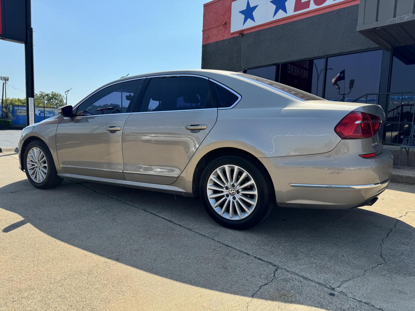 2016 GOLD VOLKSWAGEN PASSAT (1VWBS7A37GC) , located at 5900 E. Lancaster Ave., Fort Worth, TX, 76112, (817) 457-5456, 0.000000, 0.000000 - This is a 2016 VOLKSWAGEN PASSAT 4 DR SEDAN that is in excellent condition. The interior is clean with no rips or tears or stains. All power windows, door locks and seats. Ice cold AC for those hot Texas summer days. It is equipped with a CD player, AM/FM radio, AUX port, Bluetooth connectivity and - Photo#7