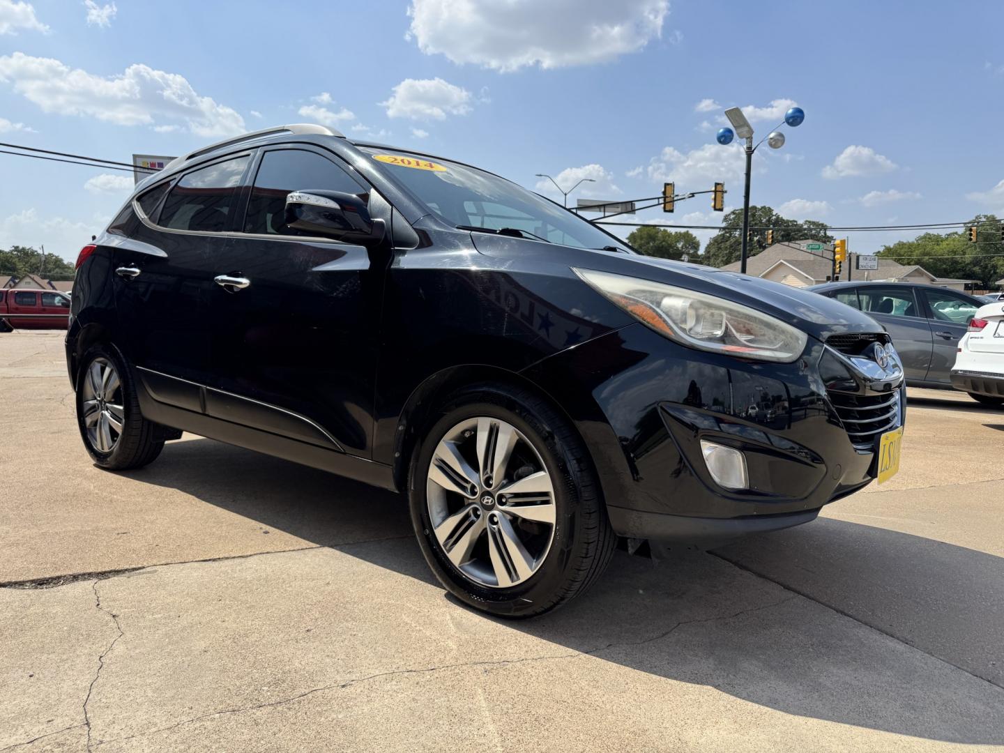 2014 BLACK HYUNDAI TUCSON LIMITED; SE (KM8JU3AG3EU) , located at 5900 E. Lancaster Ave., Fort Worth, TX, 76112, (817) 457-5456, 0.000000, 0.000000- Photo#2