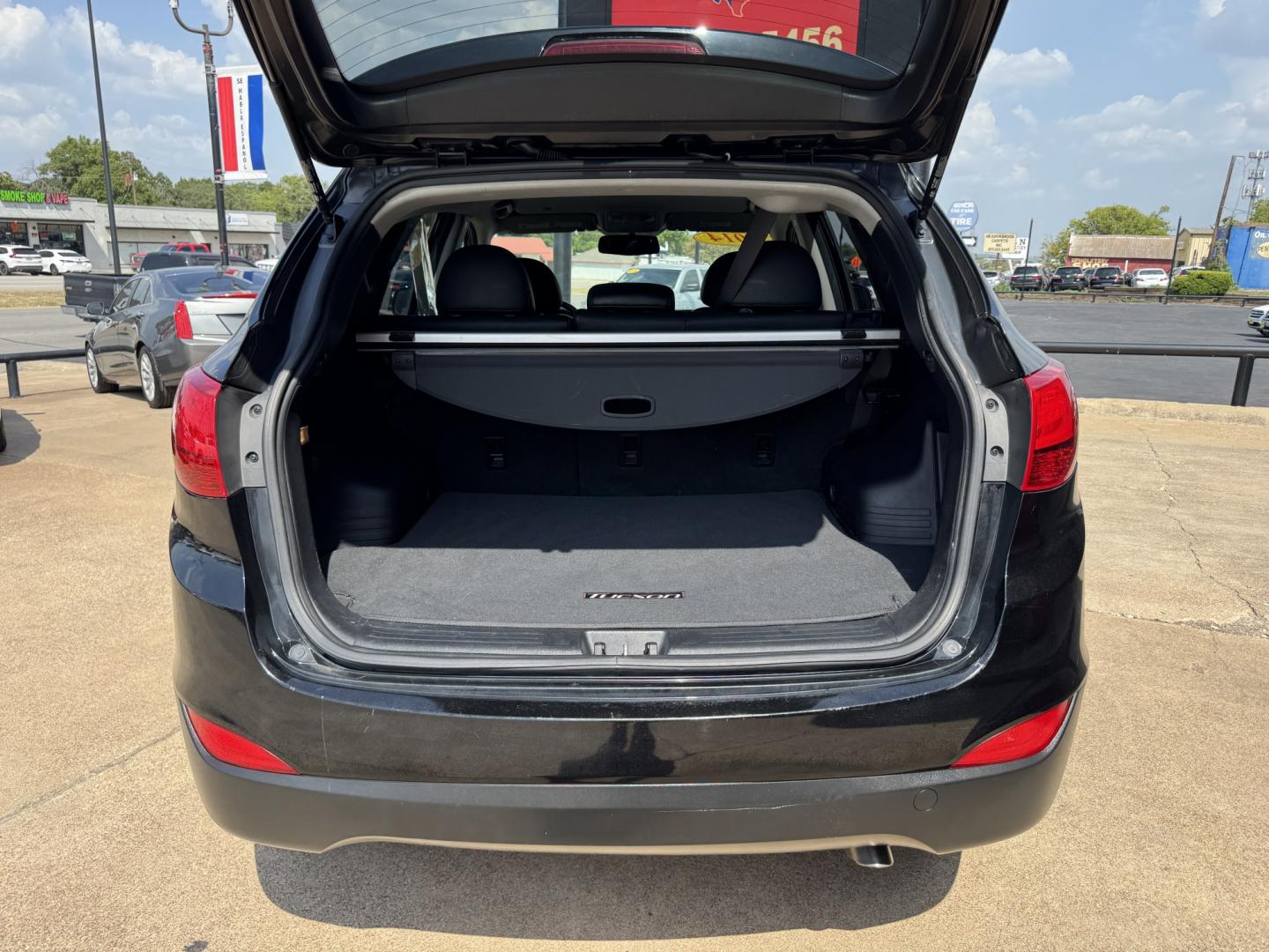 2014 BLACK HYUNDAI TUCSON LIMITED; SE (KM8JU3AG3EU) , located at 5900 E. Lancaster Ave., Fort Worth, TX, 76112, (817) 457-5456, 0.000000, 0.000000- Photo#5