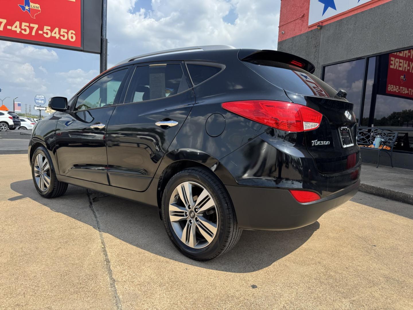 2014 BLACK HYUNDAI TUCSON LIMITED; SE (KM8JU3AG3EU) , located at 5900 E. Lancaster Ave., Fort Worth, TX, 76112, (817) 457-5456, 0.000000, 0.000000- Photo#6